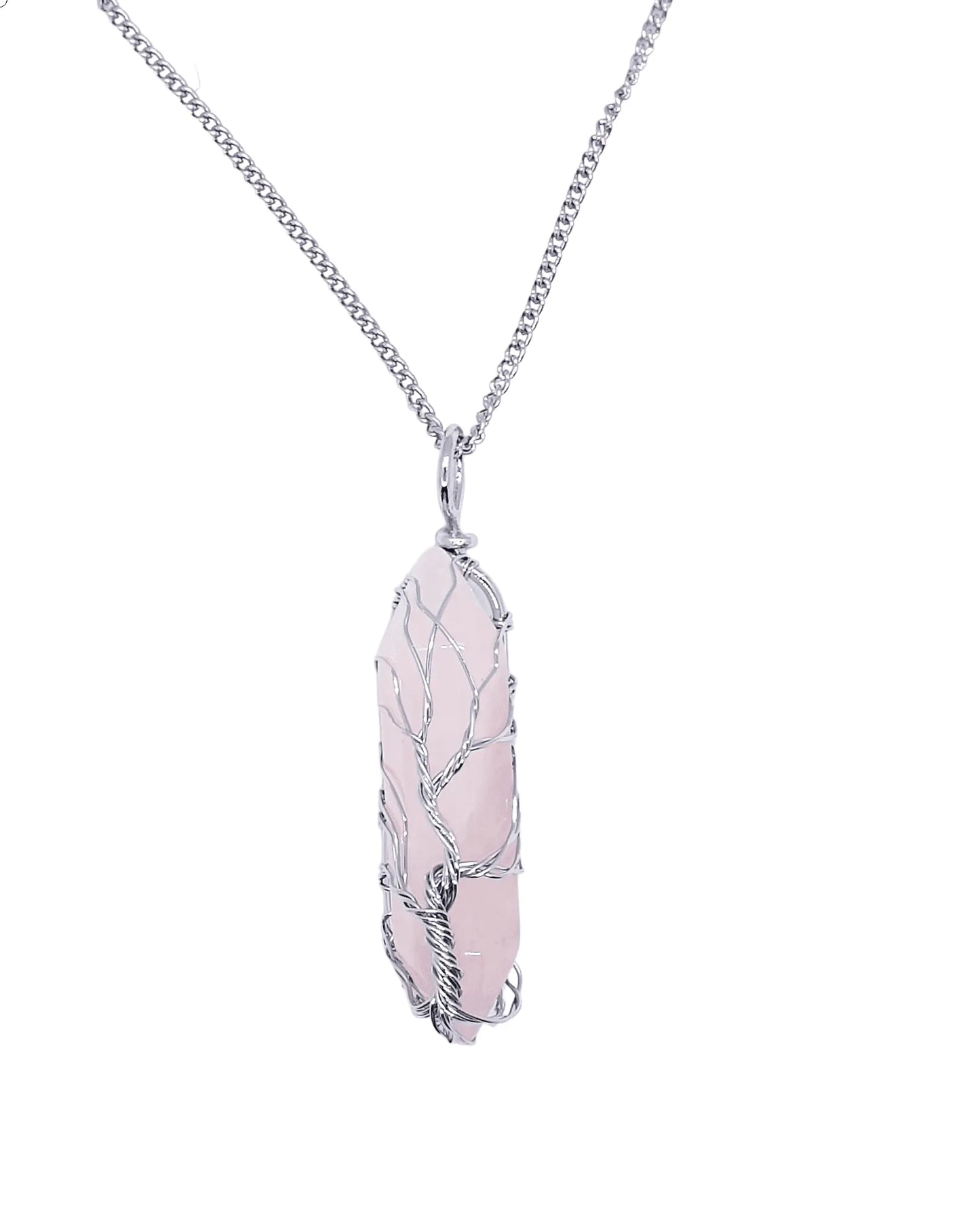Rose quartz wire tree pendant detail showing pink crystal tree for love and emotional healing from The Witches Hollow UK