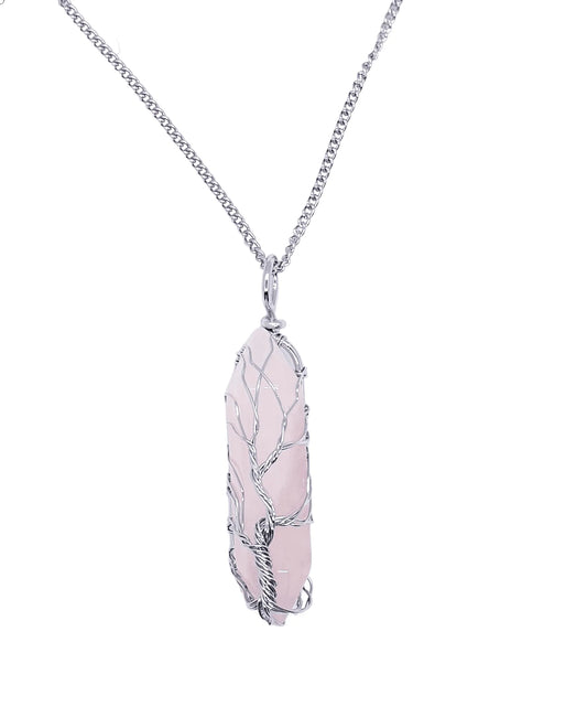 Rose quartz wire tree pendant detail showing pink crystal tree for love and emotional healing from The Witches Hollow UK