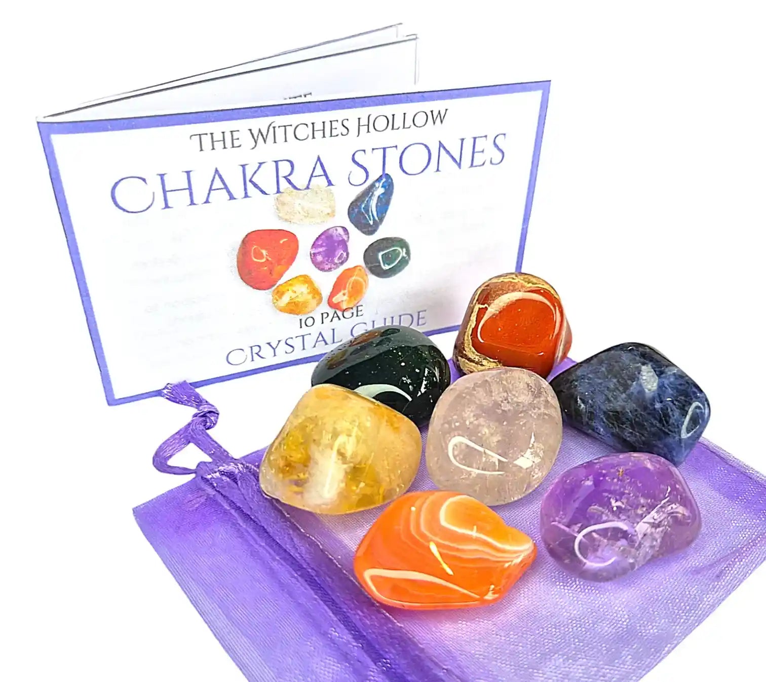 Chakra stones crystal healing set with amethyst, sodalite, green aventurine, carnelian, citrine, clear quartz and red jasper in purple organza bag with crystal guide from The Witches Hollow UK