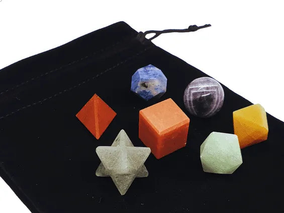 Seven chakra crystal runes geometry set featuring rainbow stones for chakra guidance and spiritual divination from The Witches Hollow UK