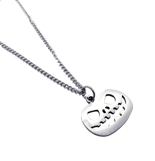 Smiling pumpkin necklace with Halloween pendant for seasonal gothic jewelry and autumn magic from The Witches Hollow UK