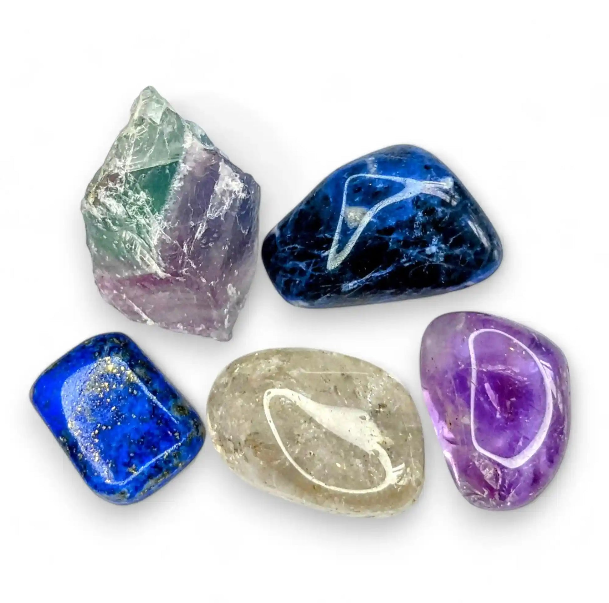 Study and exam crystals set featuring fluorite, lapis lazuli, amethyst, sodalite and clear quartz for focus and concentration