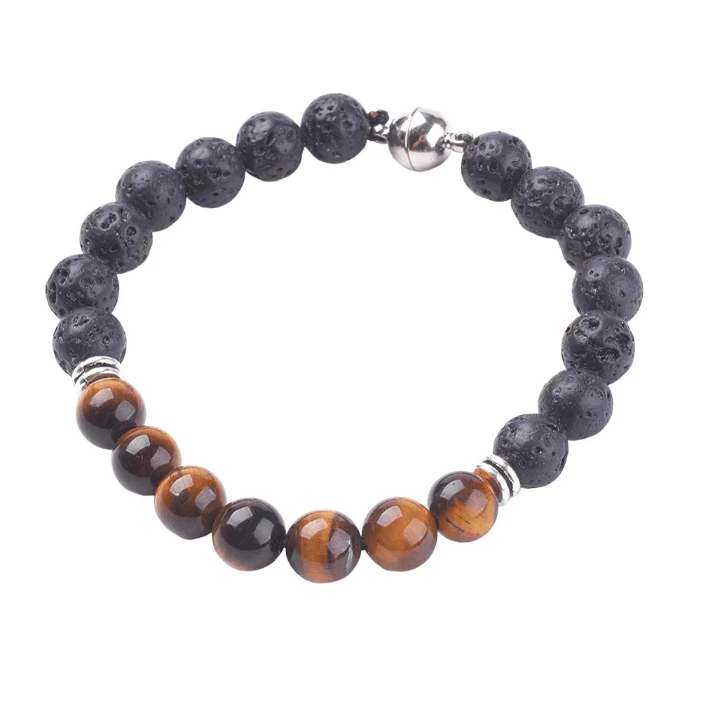 Tigers eye lava stone bracelet detail showing golden and black stones for grounding and courage from The Witches Hollow UK