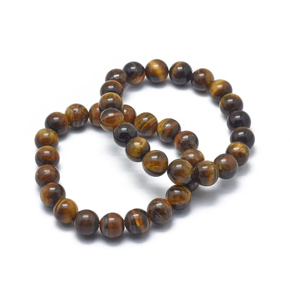 Tigers eye rounded crystal bracelet featuring golden stone beads for strength and grounding from The Witches Hollow UK