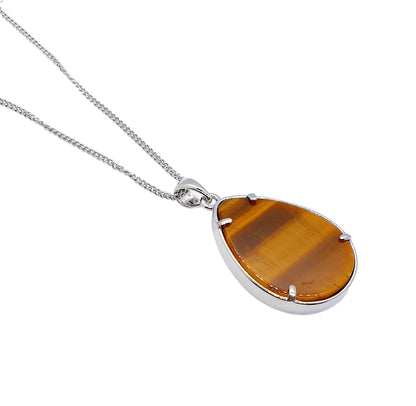 Tigers eye teardrop pendant with golden brown crystal for personal power and grounding from The Witches Hollow UK