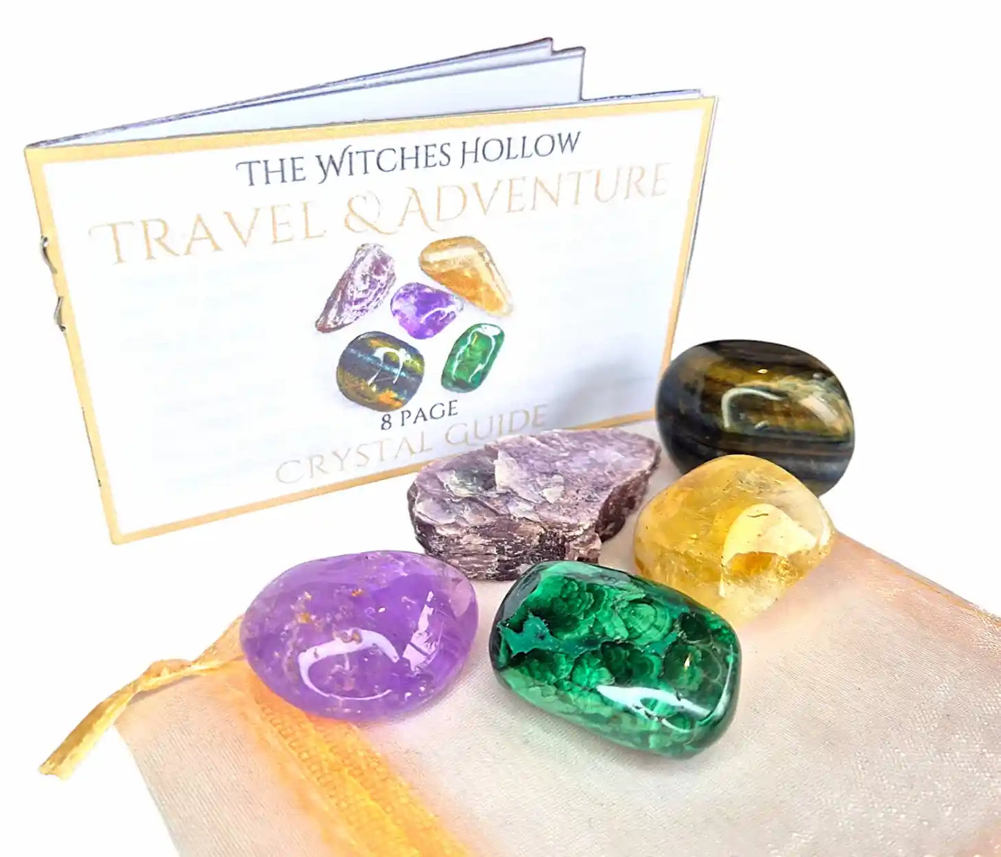 Travel protection adventure crystal pack complete set showing crystals, golden drawstring pouch and 8-page crystal guide booklet for safe travel and adventure protection - The Witches Hollow UK