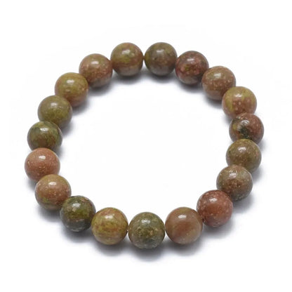 Unakite crystal bracelet detail with green-pink stones for emotional healing and heart balance from The Witches Hollow UK