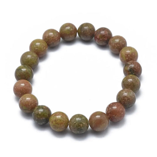 Unakite crystal bracelet detail with green-pink stones for emotional healing and heart balance from The Witches Hollow UK