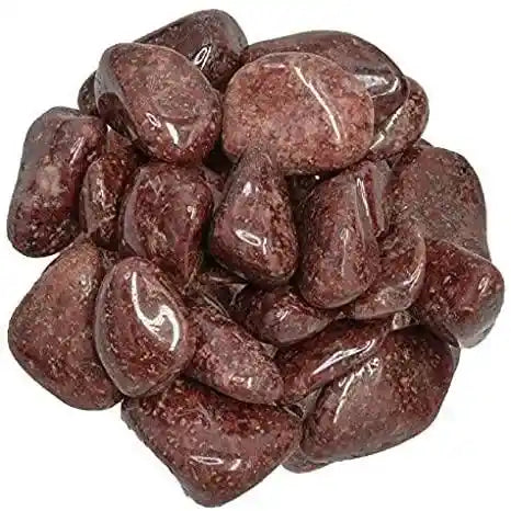 Wine red quartz tumble stone with deep red crystal for passion and life force energy from The Witches Hollow UK