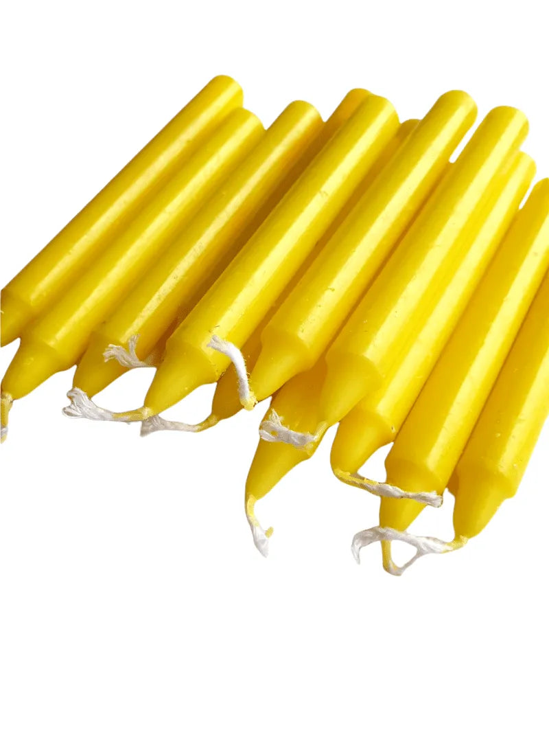 Yellow spell candle with yellow wax for creativity and solar plexus chakra magic from The Witches Hollow UK